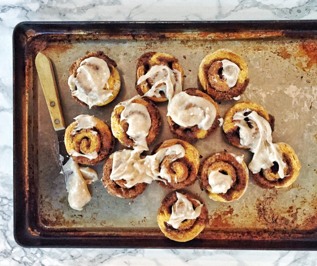 Pumpkin Cream Cheese Cinnamon Rolls on a pan