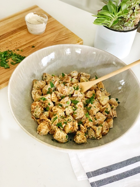 roasted potato salad with caramelized shallots serving
